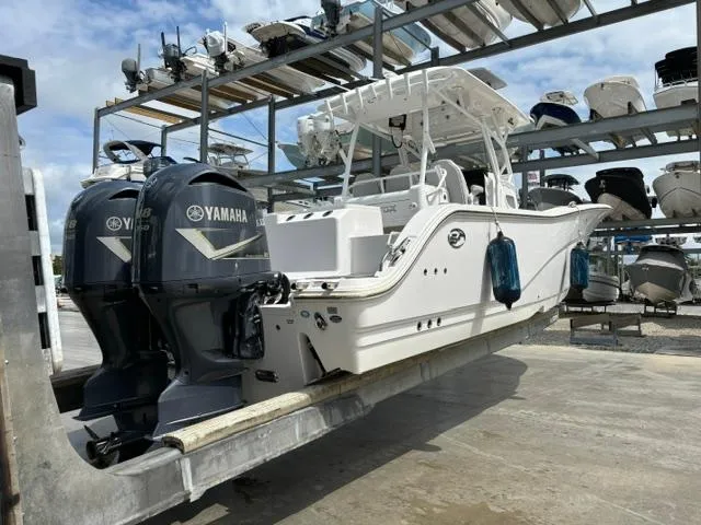 Slide: The Image of 2020 Sea Fox Commander 328 boat with Yamaha engines in storage facility. - 4