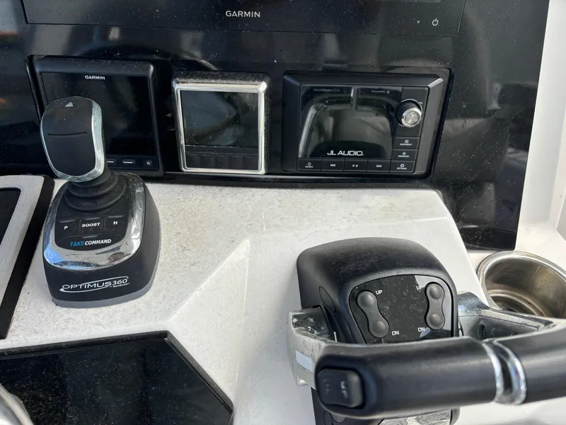 Slide: The Image of Sea Fox Commander 328 control panel with Garmin and JL Audio systems, 2020 model. - 9
