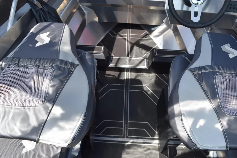 Slide: The Image of 2025 Stabicraft 1550 Fisher Profish interior with modern seating and sleek design. - 20