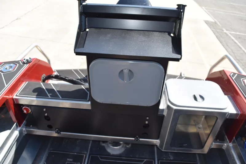 Slide: The Image of 2025 Stabicraft 1550 Fisher Profish boat interior with storage compartments and sleek design. - 24