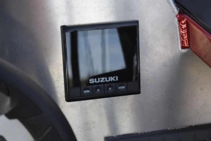 Slide: The Image of Suzuki display on 2025 Stabicraft 1550 Fisher Profish boat dashboard. - 26