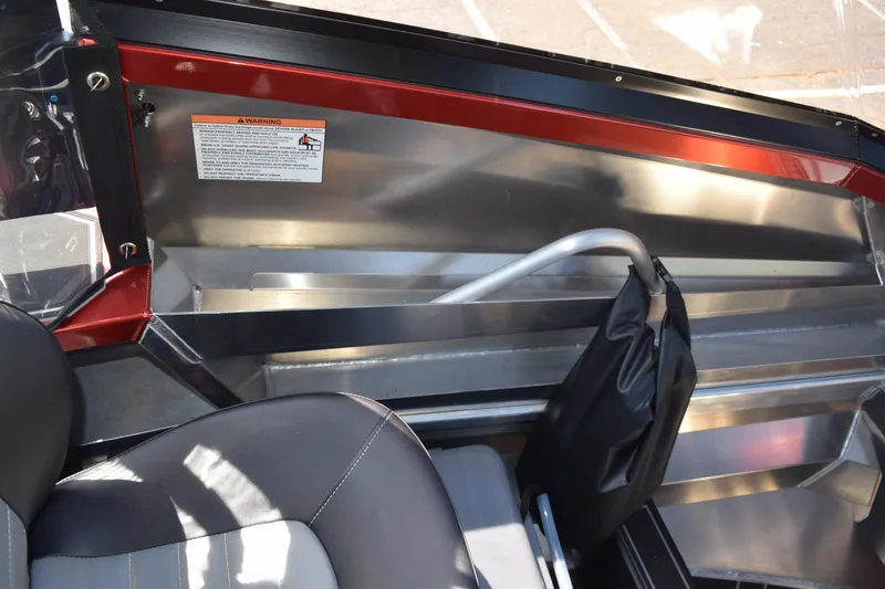 Slide: The Image of Interior of 2025 Stabicraft 1550 Fisher Profish boat, featuring seating and metal finish. - 28