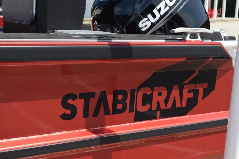 Slide: The Image of 2025 Stabicraft 1550 Fisher Profish boat with Suzuki engine branding. - 4