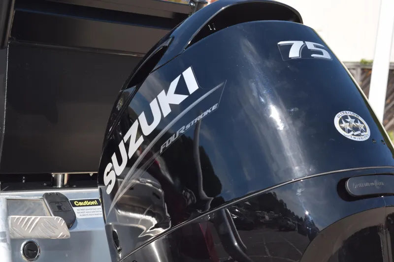 Slide: The Image of Suzuki 75 outboard motor on 2025 Stabicraft 1550 Fisher Profish boat. - 5