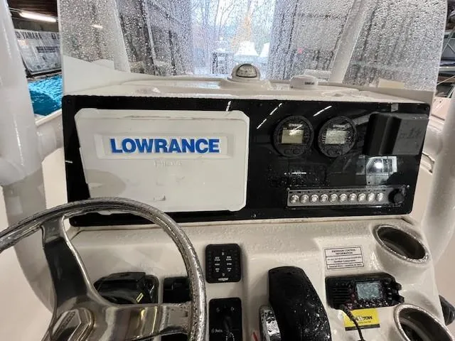 Slide: The Image of Dashboard of 2021 Tidewater 220 CC Adventure with Lowrance navigation system. - 13