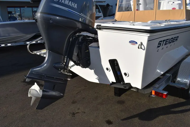 Slide: The Image of 2025 Steiger Craft 21 Peconic boat with Yamaha outboard motor, rear view. - 11