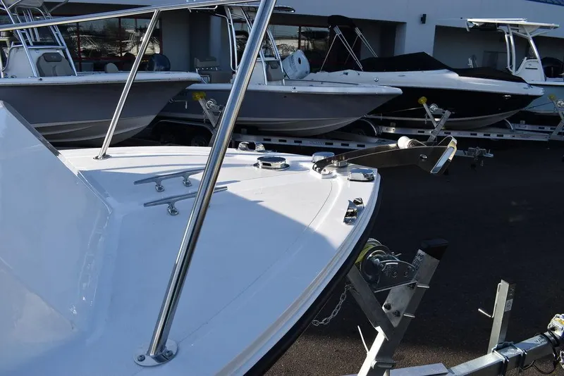 Slide: The Image of 2025 Steiger Craft 21 Peconic boat on trailer, displayed outdoors. - 17