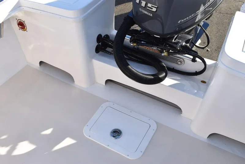 Slide: The Image of 2025 Steiger Craft 21 Peconic boat with Yamaha engine, rear deck view. - 22