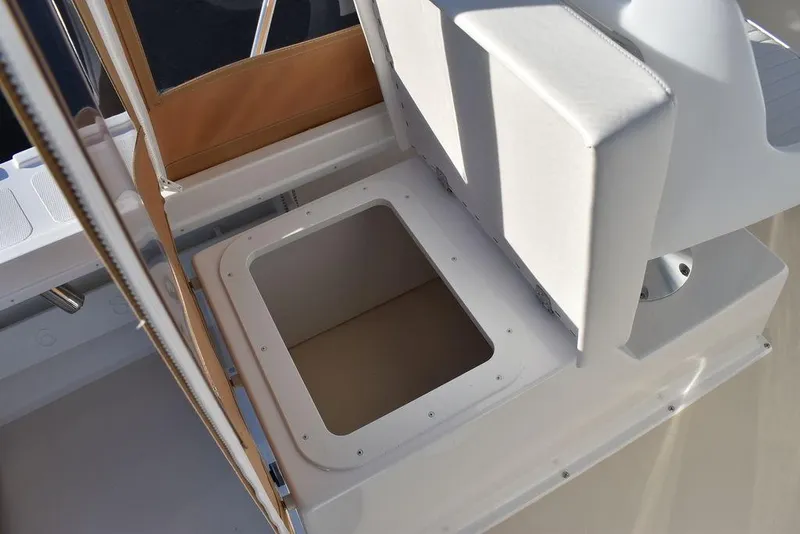 Slide: The Image of 2025 Steiger Craft 21 Peconic boat seat storage compartment, open and ready for use. - 36