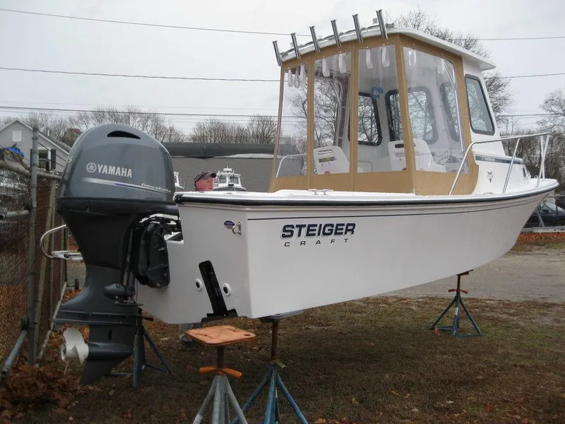 Slide: The Image of 2025 Steiger Craft 21 Peconic boat with Yamaha outboard motor on display. - 4