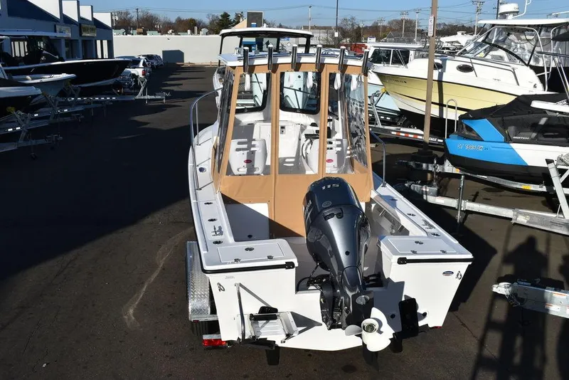 Slide: The Image of 2025 Steiger Craft 21 Peconic boat with outboard motor in a marina. - 8