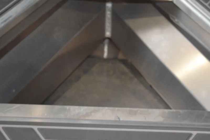 Slide: The Image of 2024 Stabicraft 1550 Frontier SportFish storage compartment, interior view. - 17