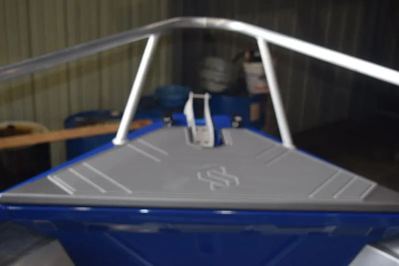 Slide: The Image of 2024 Stabicraft 1550 Frontier SportFish boat, bow view in a storage area. - 19