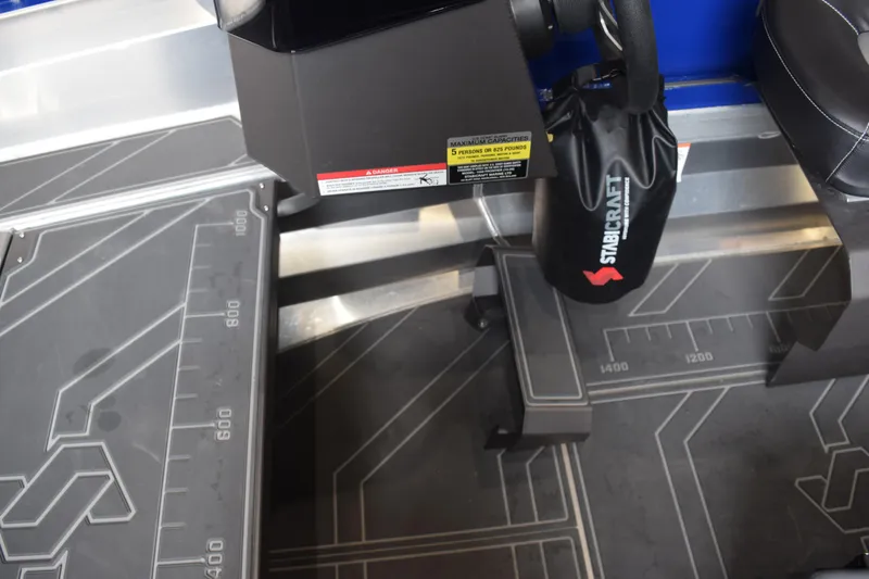 Slide: The Image of 2024 Stabicraft 1550 Frontier SportFish interior with detailed flooring and equipment. - 21