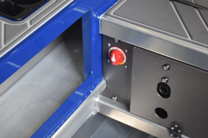 Slide: The Image of 2024 Stabicraft 1550 Frontier SportFish interior detail with blue and silver accents. - 8