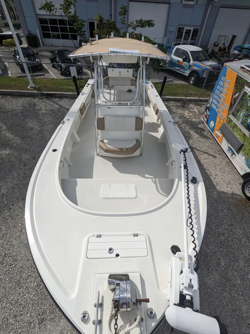 Slide: The Image of 2019 Parker 2500 SE Center Console boat with spacious deck and canopy. - 18