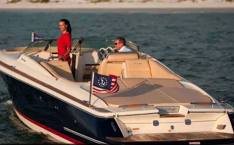 Slide: The Image of 2014 Chris-Craft Launch 32 boat with teak swim platform and cushioned seating. - 10