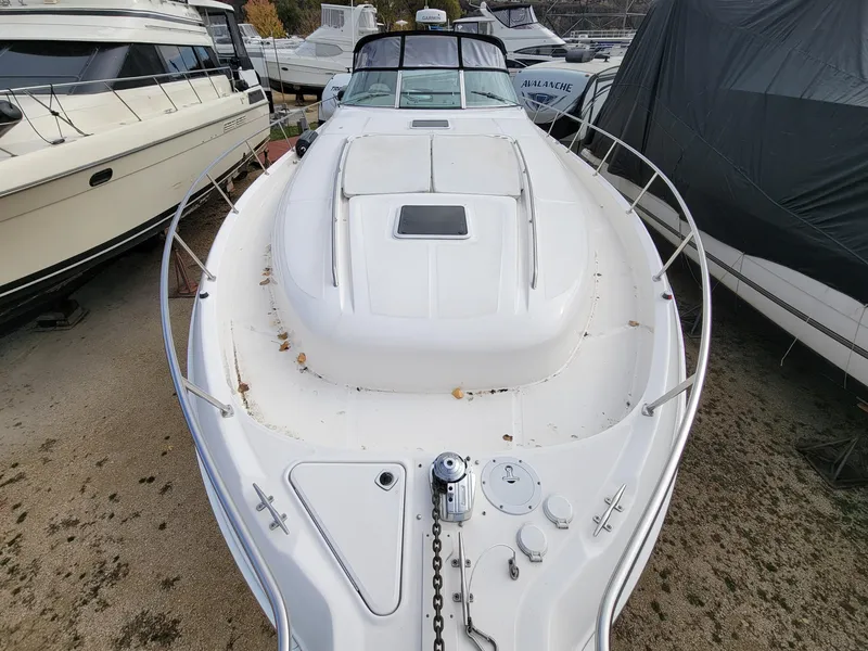 Slide: The Image of 2000 Sea Ray 460 Sundancer yacht, docked, top view of bow and deck. - 15