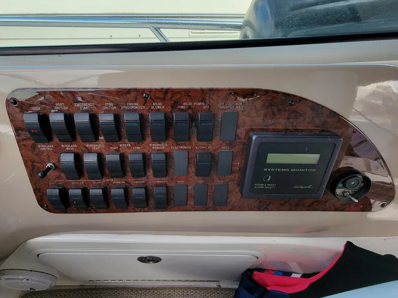 Slide: The Image of Control panel of a 2000 Sea Ray 460 Sundancer boat. - 23