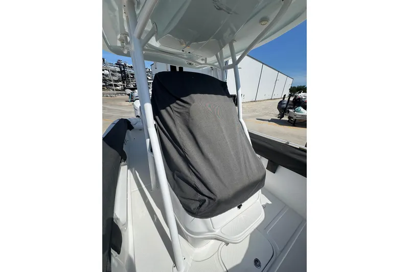 Slide: The Image of 2021 Glasstream 280 Pro-XS boat seat covered, dockside view. - 15