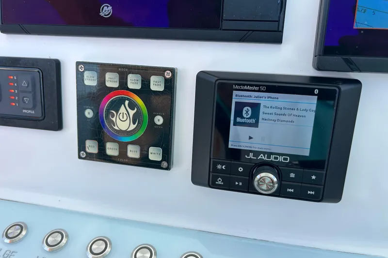 Slide: The Image of Control panel of 2021 Glasstream 280 Pro-XS with JL Audio system and lighting controls. - 17