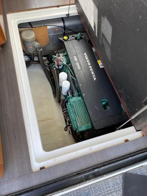 Slide: The Image of Engine compartment of a 2016 Beneteau Swift Trawler 30, featuring a Volvo Penta engine. - 13