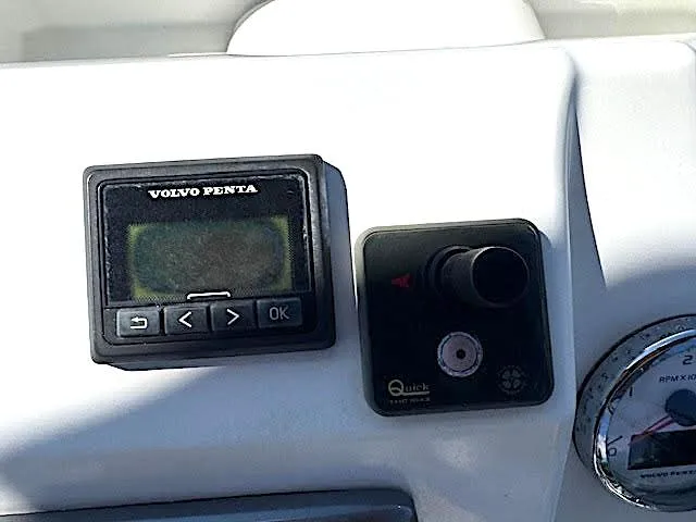 Slide: The Image of Control panel of a 2016 Beneteau Swift Trawler 30 with Volvo Penta display. - 37