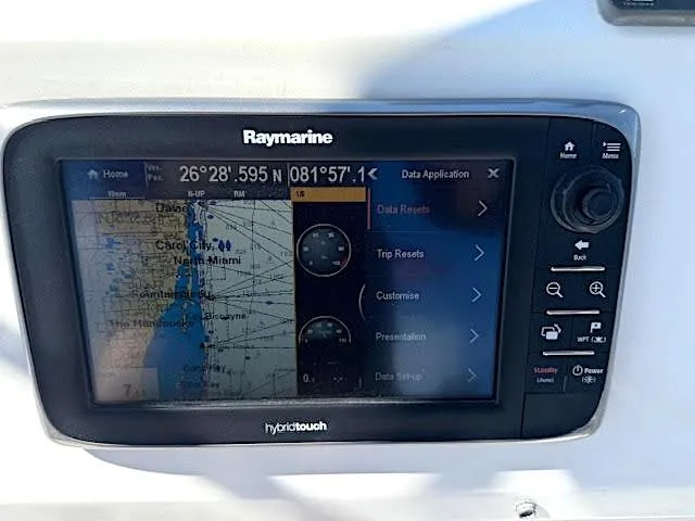 Slide: The Image of Raymarine navigation system on 2016 Beneteau Swift Trawler 30, displaying nautical map and coordinates. - 38