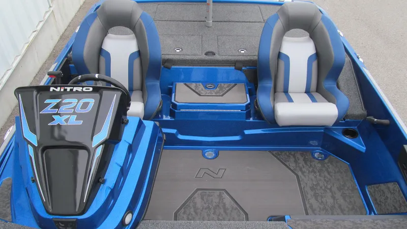 Slide: The Image of 2025 Nitro Z20 XL Pro boat interior with dual seats and sleek design. - 11