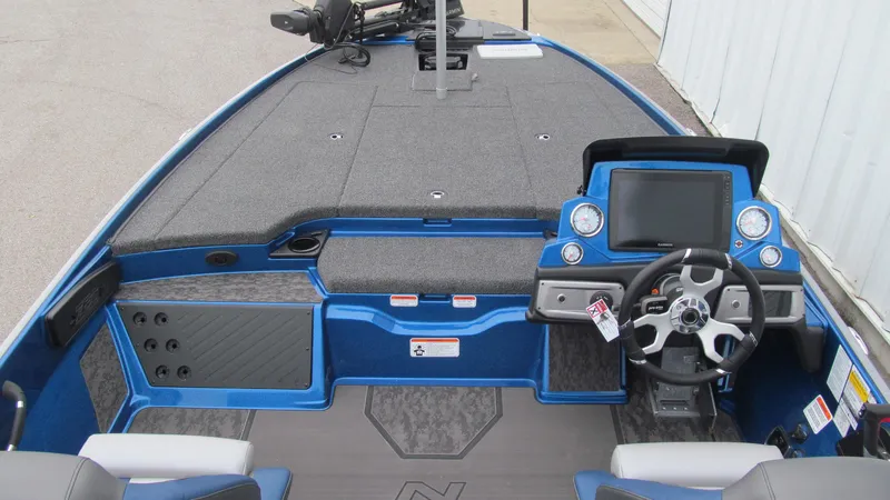 Slide: The Image of 2025 Nitro Z20 XL Pro boat interior with steering console and dashboard. - 4