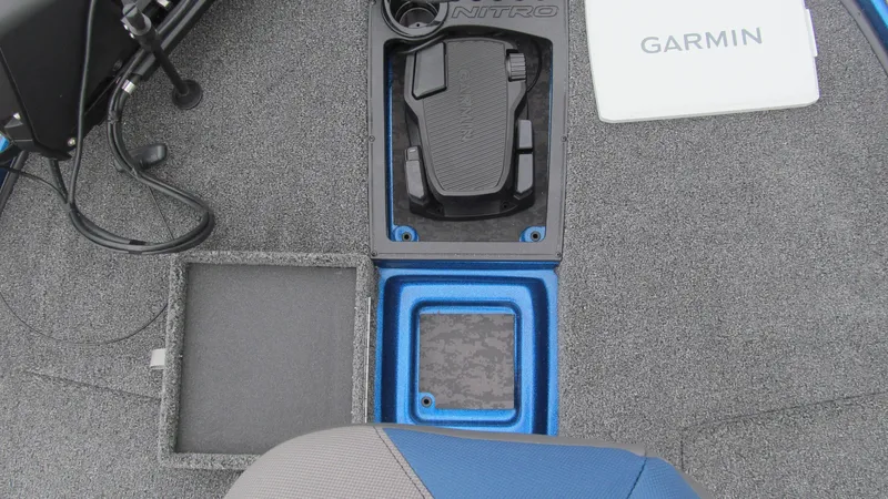 Slide: The Image of Nitro Z20 XL Pro 2025 boat deck with Garmin equipment and pedal controls. - 9