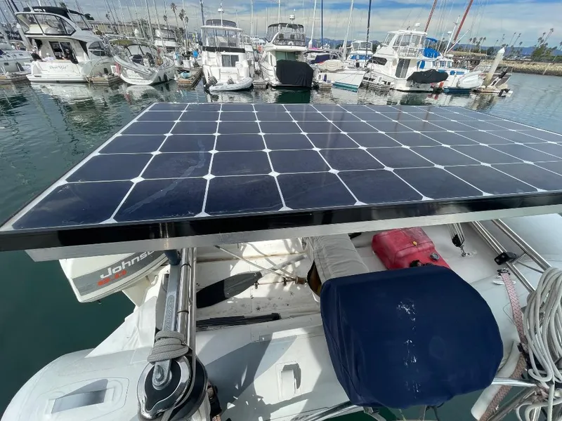 Slide: The Image of Solar panel on 1979 C & L Explorer Center Cockpit Cutter in marina. - 30