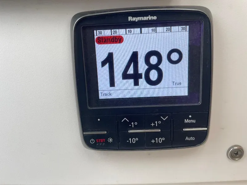 Slide: The Image of Raymarine display showing 148 degrees on a C & L Explorer Center Cockpit Cutter, 1979 model. - 35