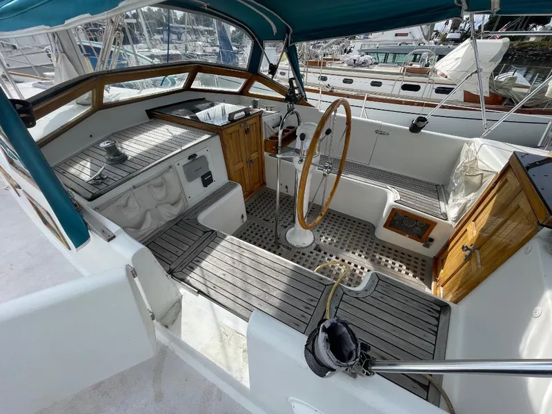 Slide: The Image of 1979 C & L Explorer Center Cockpit Cutter with wooden accents and spacious seating area. - 5