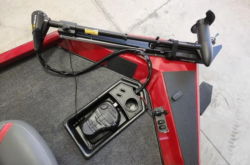 Slide: The Image of 2025 Ranger RT188 boat deck with trolling motor and foot pedal controls. - 10