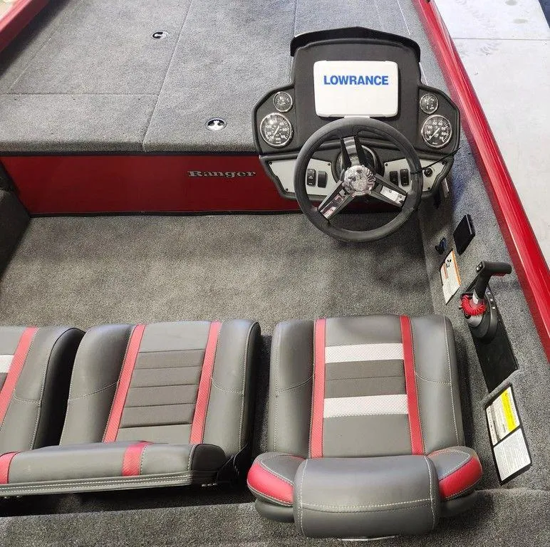 Slide: The Image of 2025 Ranger RT188 boat interior with Lowrance system and stylish seating. - 5
