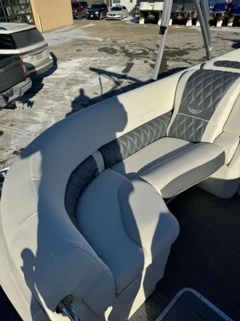 Slide: The Image of 2024 Bennington 25 QFB boat interior with luxurious seating and modern design. - 10