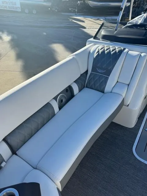 Slide: The Image of 2024 Bennington 25 QFB boat interior with luxurious seating and modern design. - 11