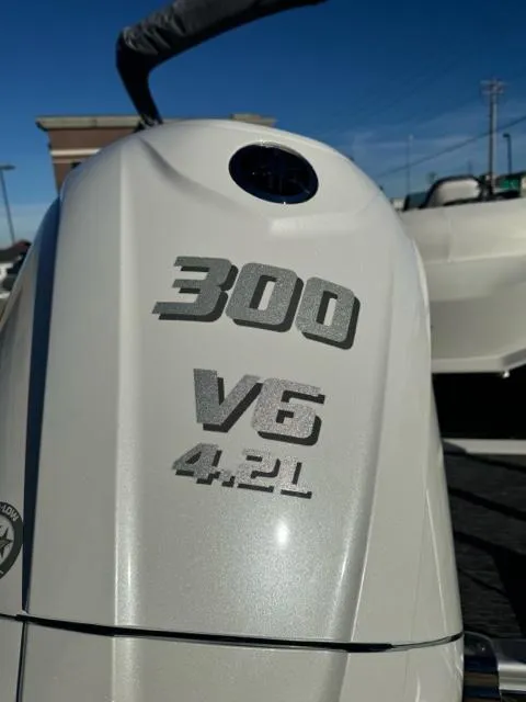 Slide: The Image of 2024 Bennington 25 QFB boat engine, 300 V6 4.2L, close-up view. - 3