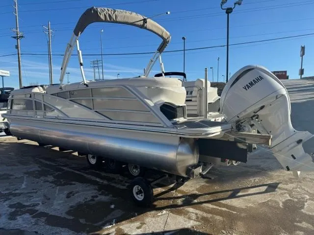 Slide: The Image of 2024 Bennington 25 QFB pontoon boat with Yamaha outboard motor on display. - 6