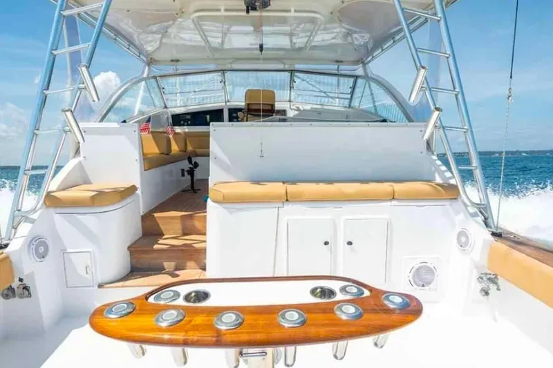 Slide: The Image of 1993 Buddy Davis Express Custom Carolina yacht interior with seating and ocean view. - 22