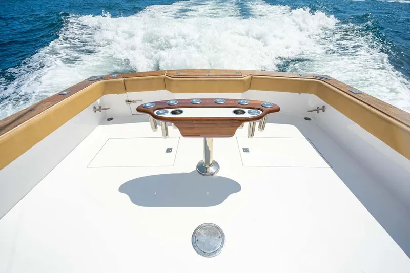 Slide: The Image of 1993 Buddy Davis Express Custom Carolina boat deck with ocean view and wake. - 25