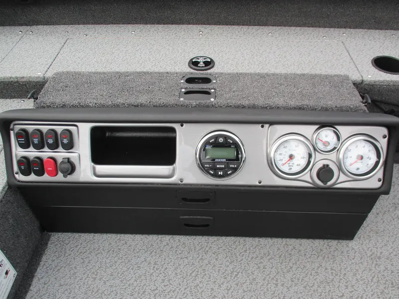 Slide: The Image of 2025 Lund Pro Guide 1875 boat dashboard with gauges and controls. - 7