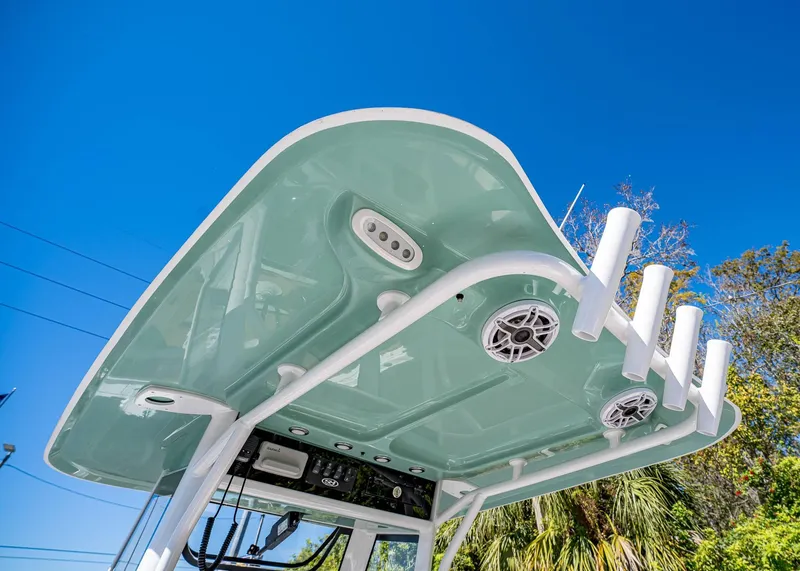 Slide: The Image of 2025 Sea Hunt Ultra 255 SE boat top view with rod holders and speakers. - 22