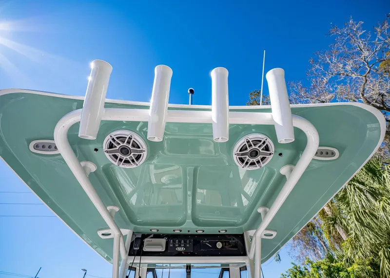 Slide: The Image of 2025 Sea Hunt Ultra 255 SE boat top view with rod holders and speakers. - 34