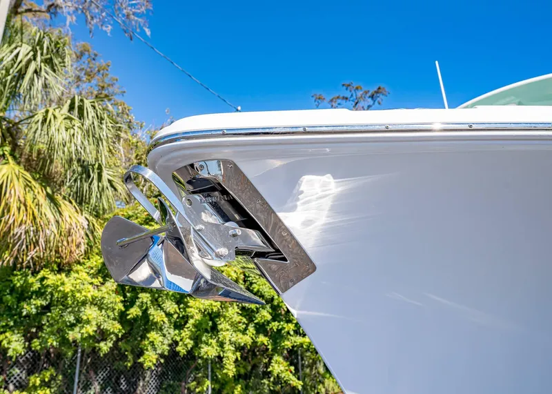 Slide: The Image of Close-up of 2025 Sea Hunt Ultra 255 SE boat anchor against blue sky. - 47