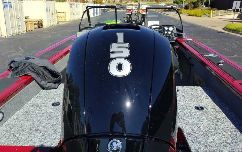 Slide: The Image of 2025 Tracker Targa V-18 WT boat with 150 horsepower engine, parked outdoors. - 4