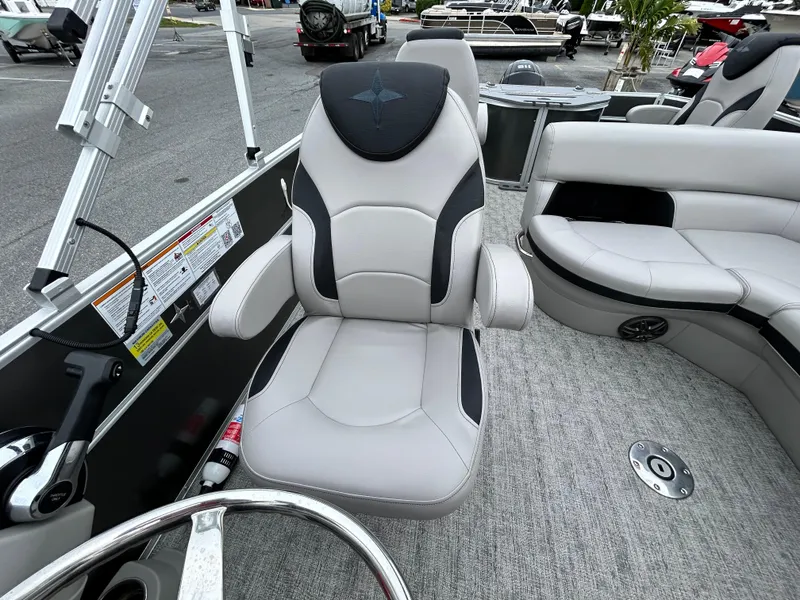 Slide: The Image of 2024 Berkshire 24RFC LE 2.75 boat interior with plush seating and modern design. - 12