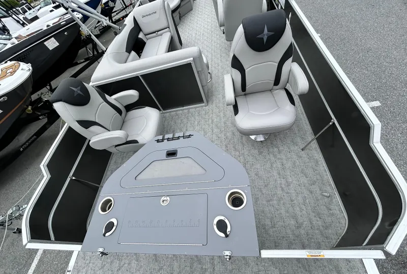 Slide: The Image of 2024 Berkshire 24RFC LE 2.75 pontoon boat interior with plush seating and modern design. - 5