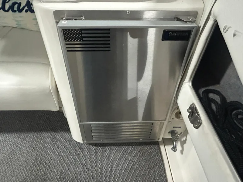 Slide: The Image of Stainless steel refrigerator on 1992 Sea Ray 370 Sundancer boat interior. - 12